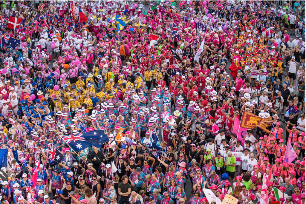 A crowd of thousands at an International Breast Cancer Paddlers’ Commission festival