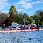 Team paddling in the Pink Boat during a Saturday open practice