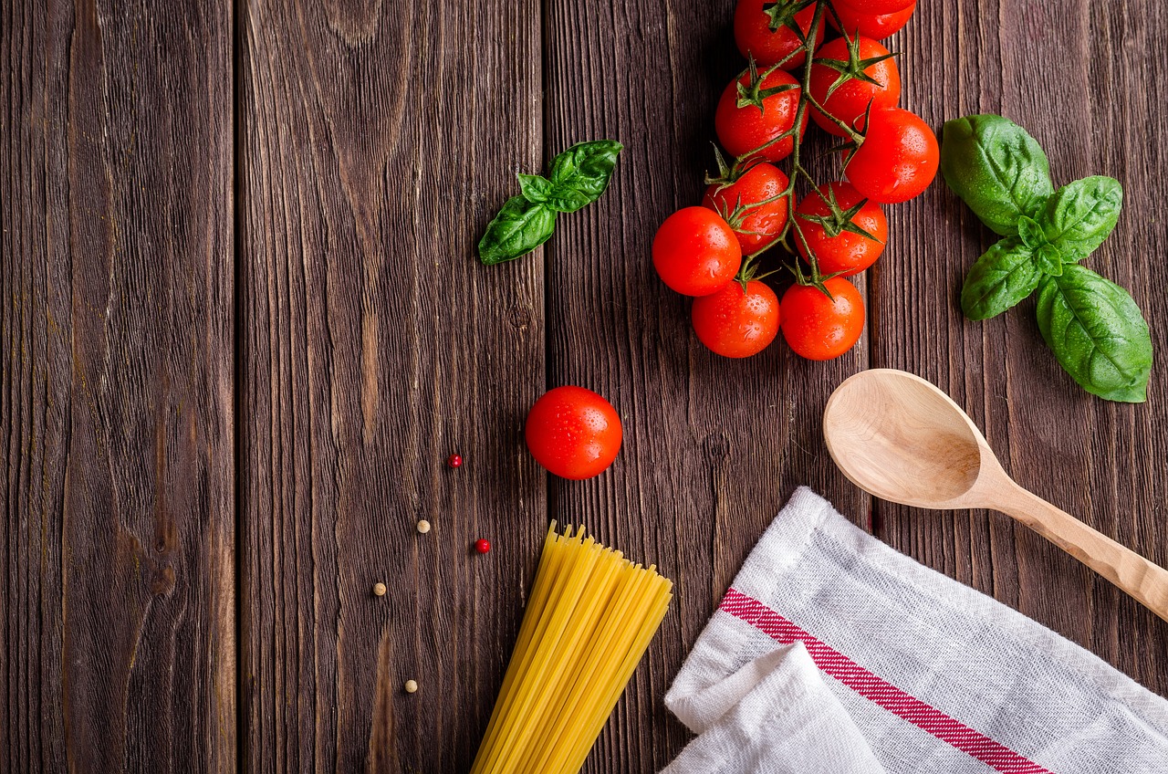 Ingredients for spaghetti on a kitchen table