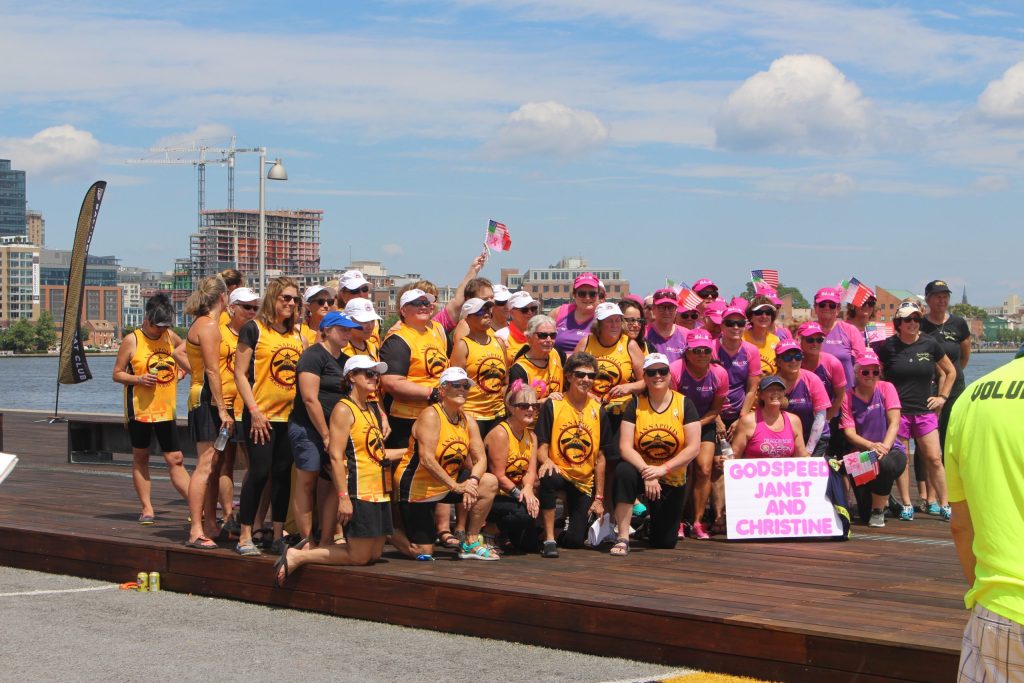 The Annapolis and GoPink!DC dragon boat teams come together after a 2019 race in Baltimore